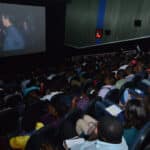 Nigerians watching a Hollywood film at a Cinema